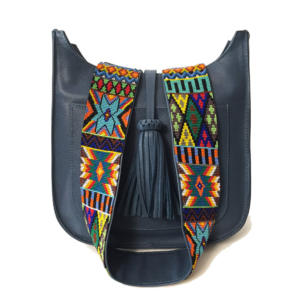 Bolsa para viaje de piel para mujer con cierre estilo bandolera con asa intercambiable de artesanía de chaquira color azul claro