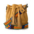 Bolsa de piel pequeña tipo morral para mujer con asa intercambiable de chaquira artesanal color amarillo
