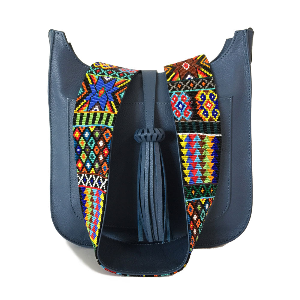 Bolsa para viaje de piel para mujer con cierre estilo bandolera  con asa intercambiable de artesanía de chaquira color azul mezclilla